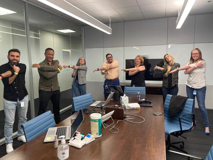 Team stretching ahead of their meeting