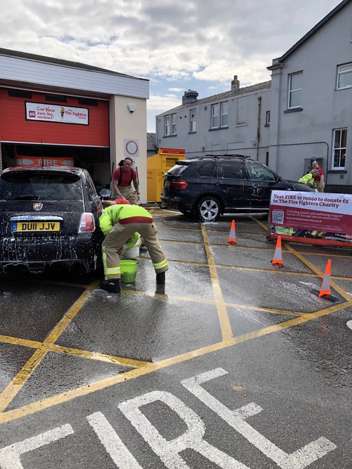 Fire crews washing cars