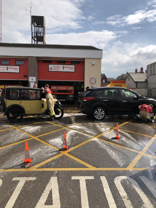 Fire crews washing cars