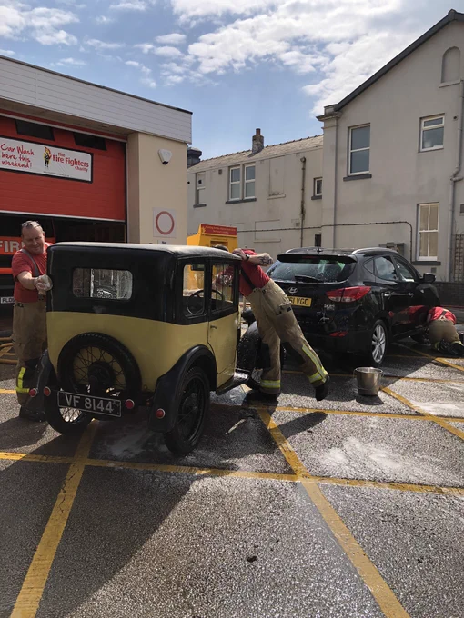 Fire crews washing cars