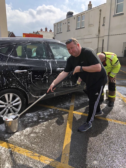 Fire crews washing cars