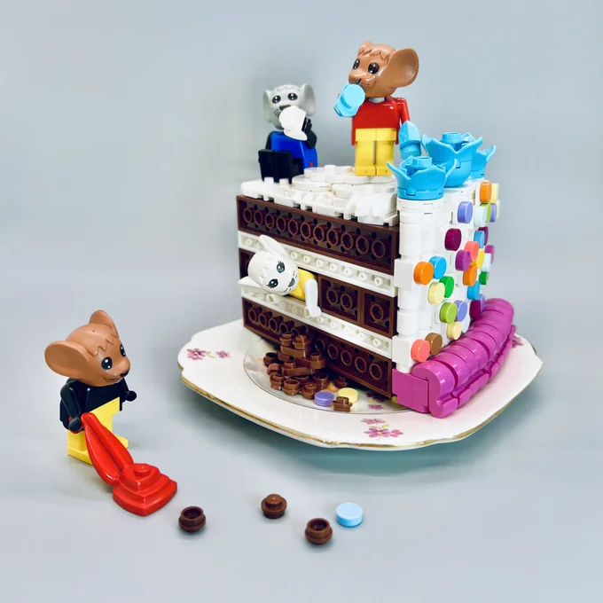 3 mice eating chocolate cake and icing whilst a 4th hoovers up crumbs.