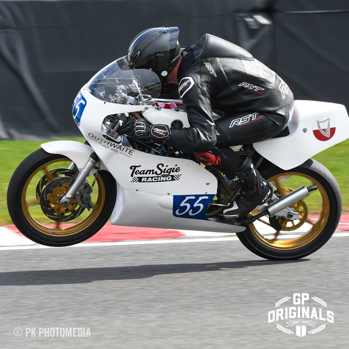 Its hard to keep the front wheel down at Oulton Park, Dan Jackson is now 3rd in the GP Originals AD Modular supported 350cc Championship