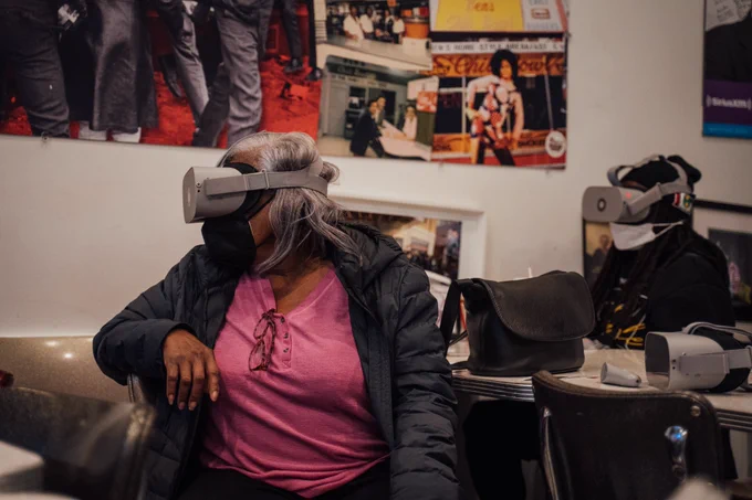 People with VR headsets experiencing the Black Broadway on U virtual tour experience.