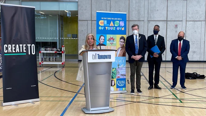 Councillor Frances Nunziata (podium), Mayor John Tory (far left), Dr. Gervan Fearon, President, George Brown College (middle), Vic Gupta, CEO, CreateTO (far right)