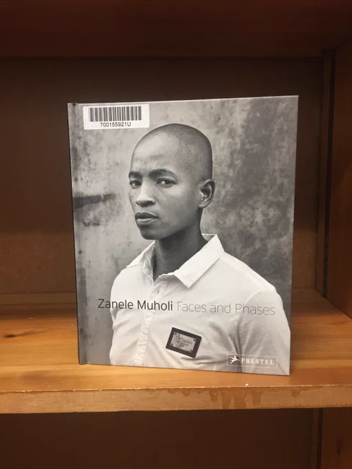 The cover of 'Faces and Phases' by Zanele Muholi, with a black and white portrait on the front. 