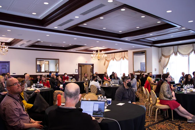 US-RSE attendees actively listening and engaged during a workshop presentation.
📸 Credit: Florevel (Floe) Fusin-Wischusen