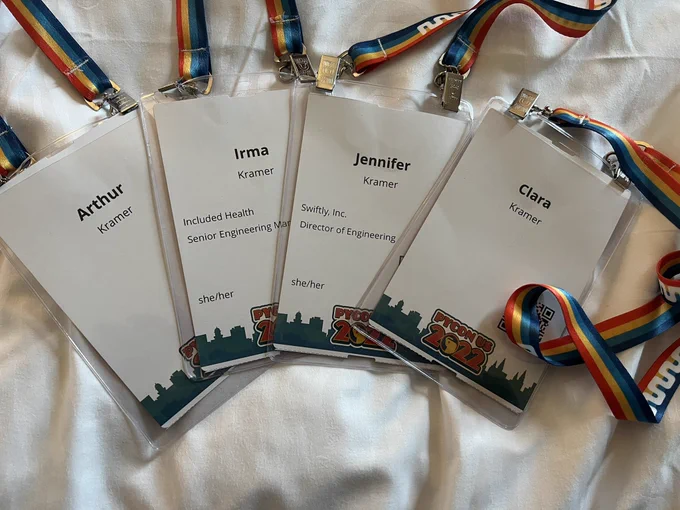 Four PyCon Badges spread out