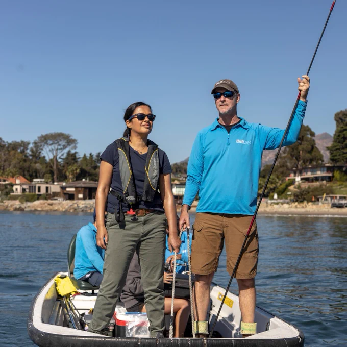 Presenter Liz Bonnin and Dr Chris Lowe aboard a boat in the USA.