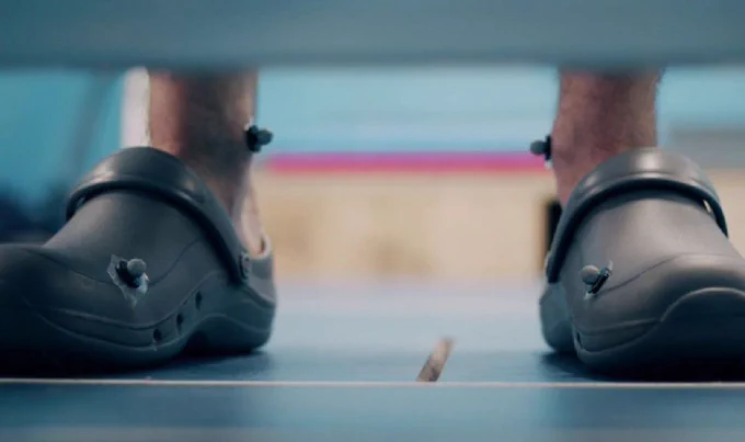 A clog shoe with markers affixed