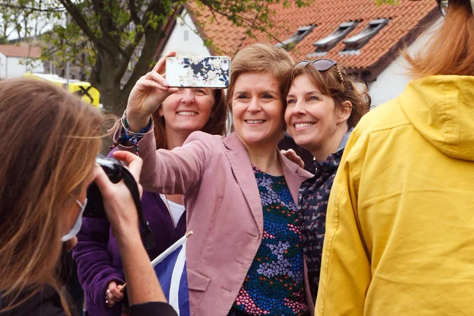 First Minister Nicola Sturgeon taking a selfie with two people