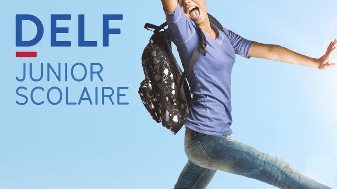 Image of excited student wearing backpack on blue background. Text: DELF junior scolaire.