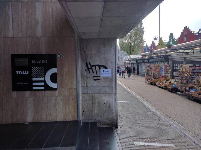 Paper sign telling where to go for the meetup