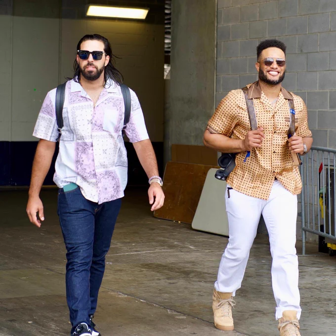 Photo of Nabil Crismatt and Robinson Canó leaving Truist Stadium following the Padres 7-3 win over the Atlanta Braves.
