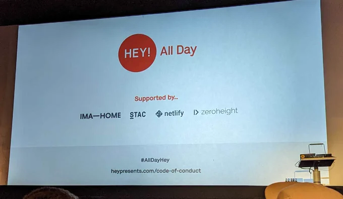 An opening slide from the All Day Hey developer and designer conference in Leeds, UK. It shows a series of sponsor logos, a hashtag "all day hey" and a URL to the conference code of conduct