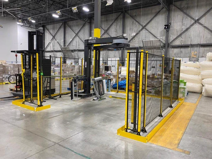 Wulftec rotary arm automatic stretch wrapper being installed