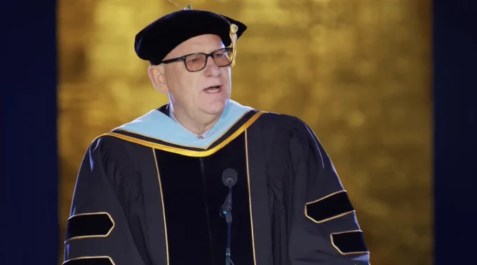 Dean speaking at ceremony.