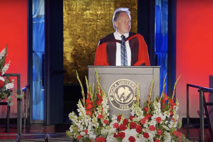 Dean speaking at ceremony.