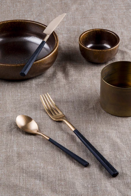 Hive in honey & black cutlery by Pinti Inox