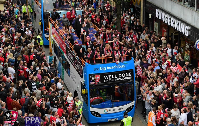 Overhead view of Exeter City's open top bus parade