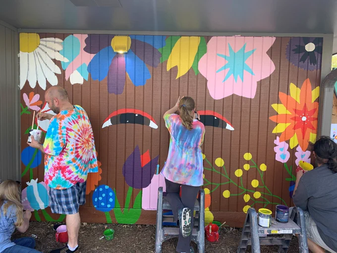 Artist Presley Shellhase (center) - her parents are on the left and her friend’s father is on the right.