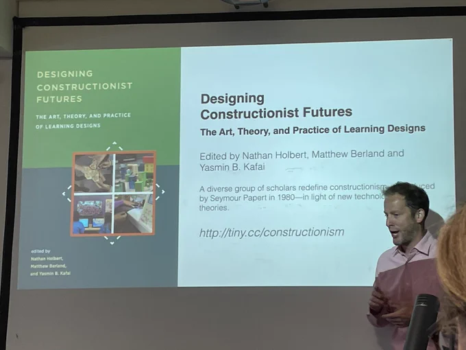 Presentation slide shows book titled ‘Designing Constructionist Futures’ edited by Holbert, Berland & Kafai