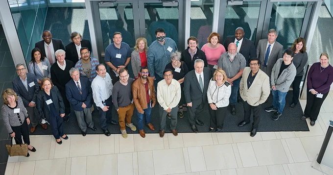 A group photo from an event honoring inventors at the University of Delaware
