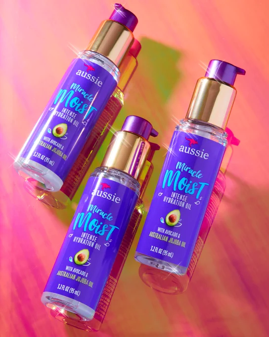 Aussie Miracle Moist Intense Hydration Oil has new limited edition golden caps! This product helps make your hair shine like gold.
