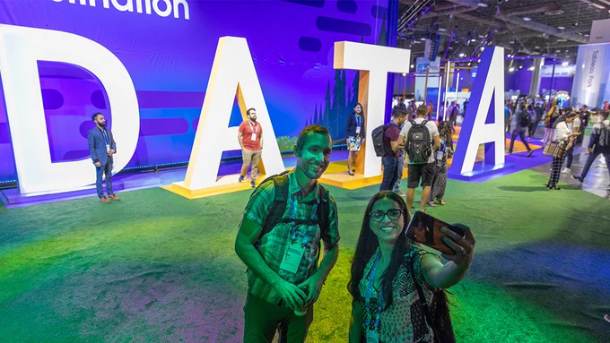 Attendees at Tableau Conference in front of DATA sign