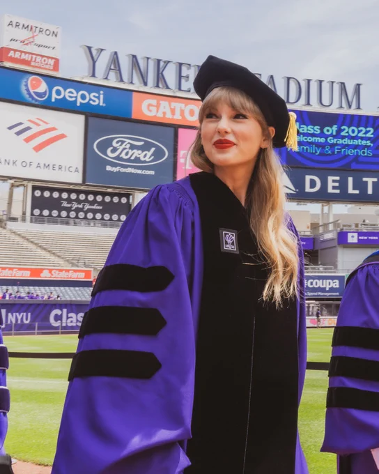 Taylor Swift in doctorate cap and gown 
