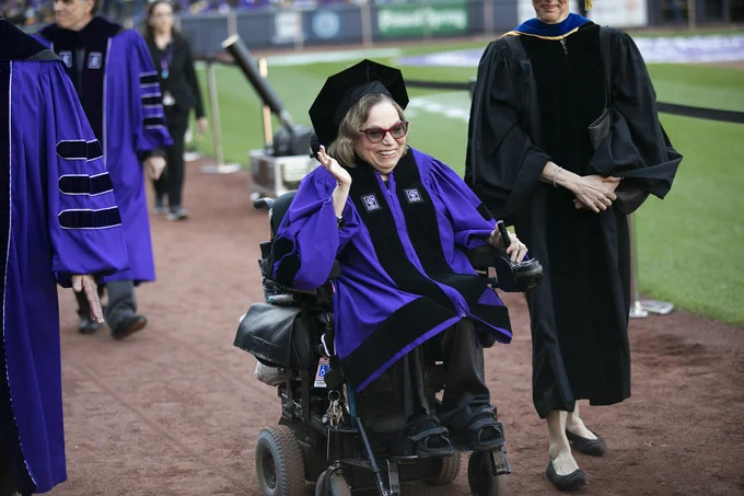 Judith Heumann in doctorate gown 