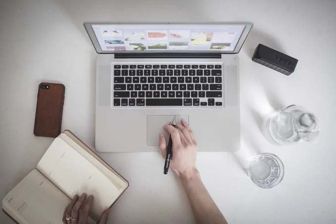 Person working on laptop - Image by Rawpixel.com