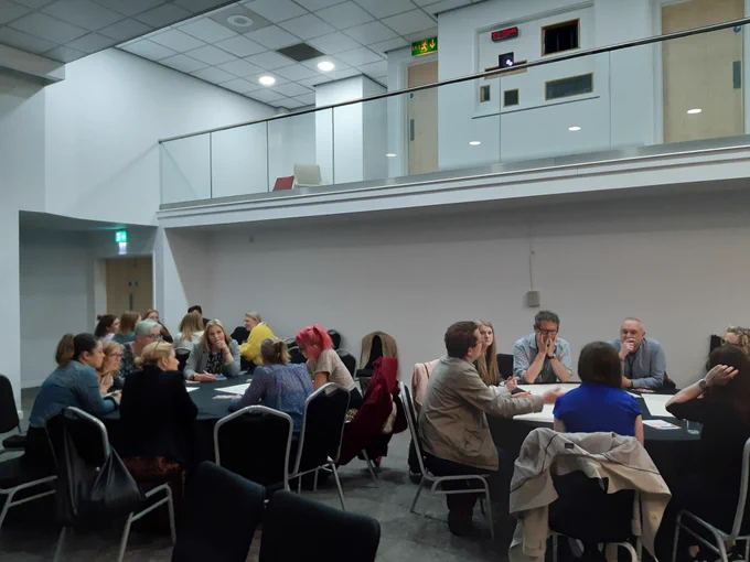 Group of people in discussion
