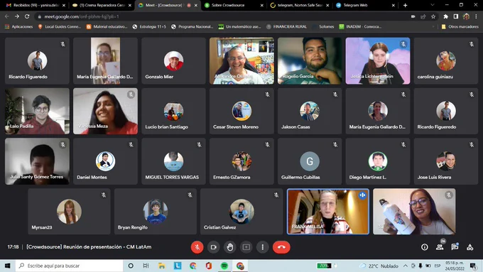 Captura de todos los asistentes en la reunión de Google Meet, algunos con cámara prendida y sonriendo.