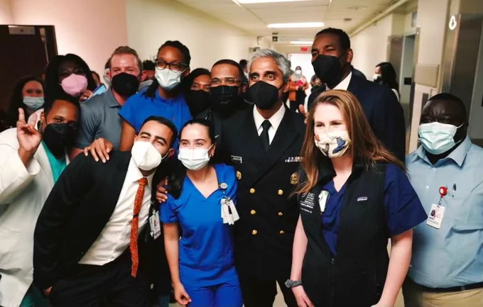 Group photo of U.S. Surgeon General Vivek Murthy with health workers at Grady Hospital in Atlanta.