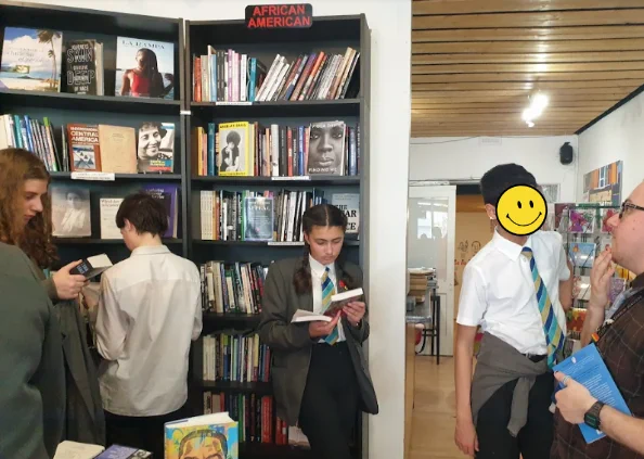 Photos of children looking at books in a book store