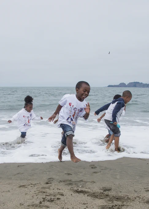 boys enjoying the beach at Baker Beach