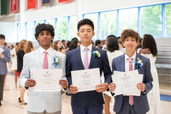 Middle School students holding up their certificates