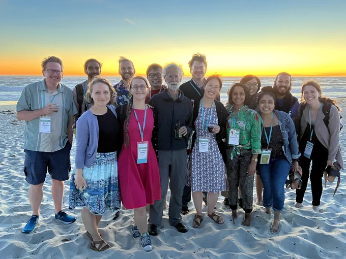 Photo of Present and Past Clark Lab Members at PEQG22