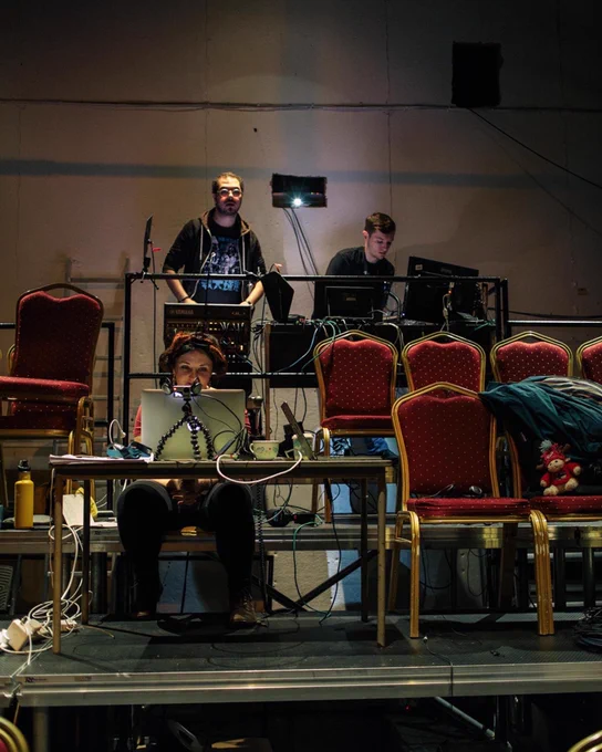 Ellie (video), Ali (sound) and Ross (video) work through their tech notes.