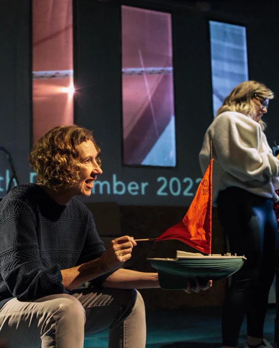 Amanda Hadingue (Carol) talks through Quantum Biology with our two Podcasters - Schultz (played by Kate Shenton) and McArdle (played by Sophie Steer).