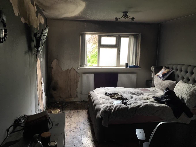 Bedroom fire caused by candle on cabinet