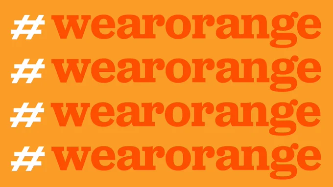 Graphic with orange background and the repeating hashtag Wear Orange