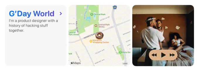 Three round rectangular tiles: a welcome message saying “G’Day World”, a map with an emoji in its center, and an album cover with play/shuttle controls.