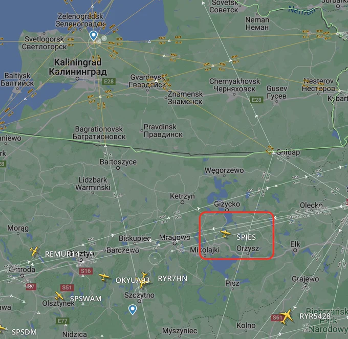 An aircraft tracker view of the border between Poland and Russia's Kaliningrad semi-exclave highlighting an aircraft labeled "SPIES".