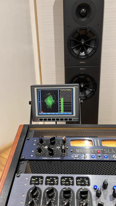 Mastering equipment & monitors pumping out the sound!