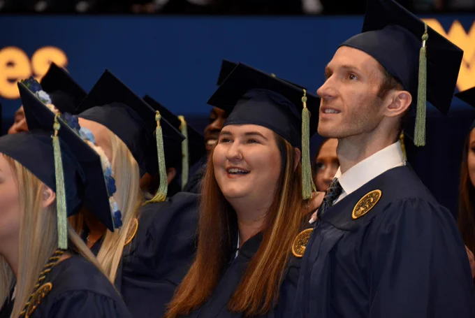WVU CPASS grads sing country roads at commencement ceremony
