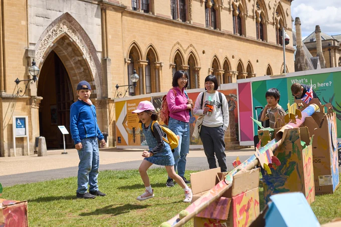 Families enjoying play equipment outside the Oxford Museum of Natural History, organised by Science Together community partners Oxfordshire Play Association (credit: Andrew Bailey)