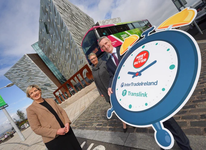 Business people standing in front of the Titanic Centre