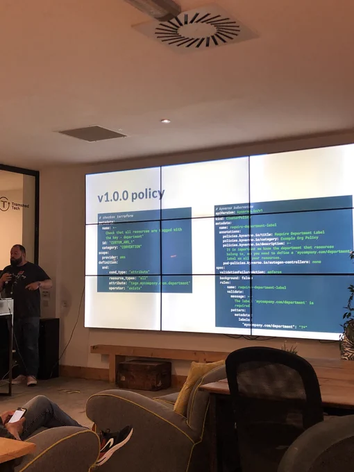 Chris showing policy as code on slide